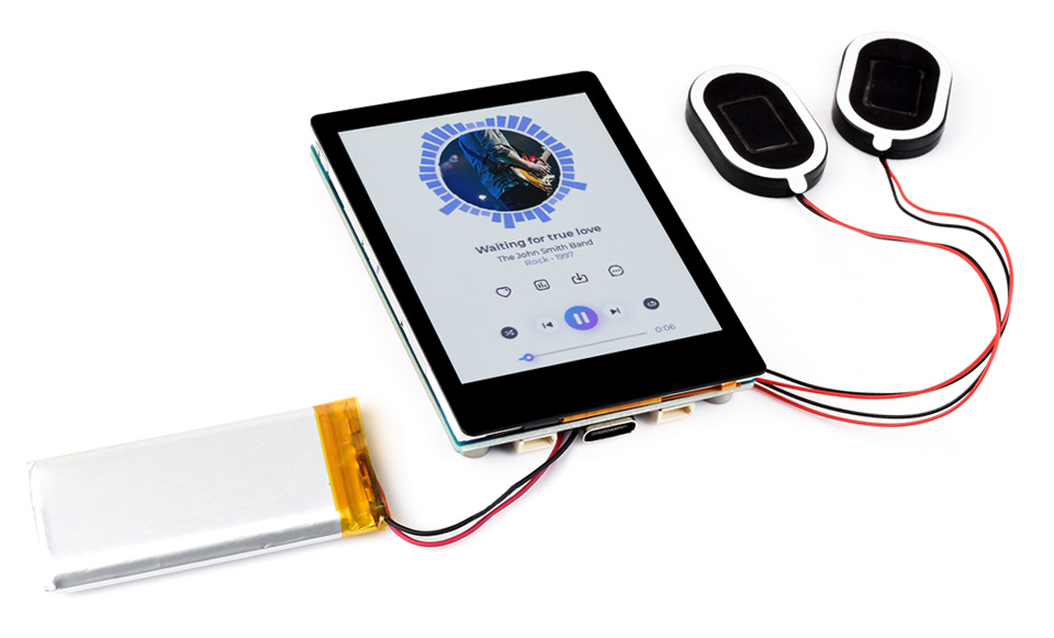 微雪 RP2350 触摸液晶开发板放在圆柱台面上展示